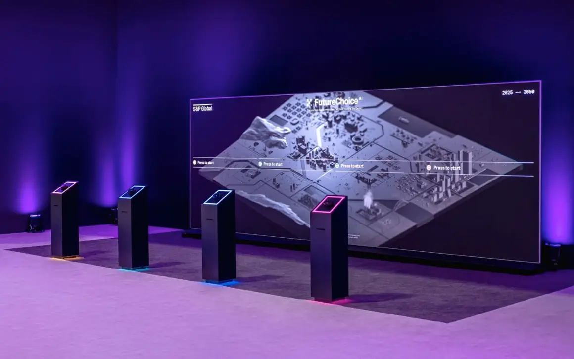 Picture of four podiums and a big wide screen